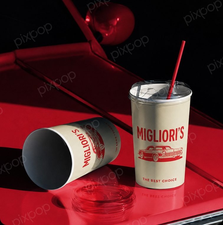 Migliori's Pizza branded drink cups on a red car
